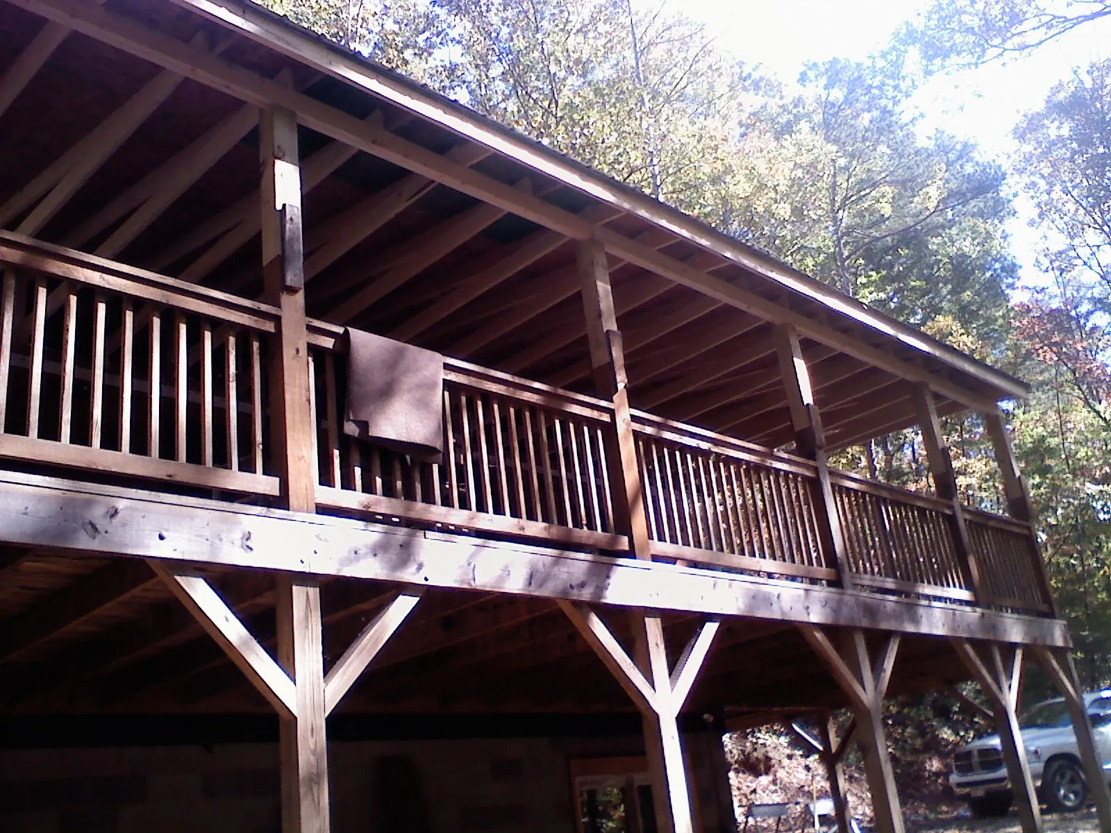 Timber framing under a new elevated porch and deck — Roof Leak Repair in Western Springs by Roofing Brothers
